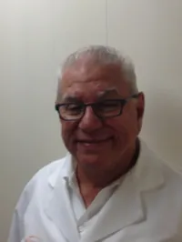 Dr. Calixto Ruibal, USCIS-designated civil surgeon at Lawndale Medical Clinic in Houston, Texas