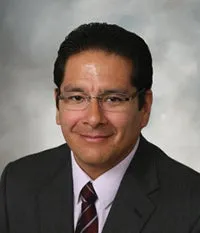 Dr. Carlos Alarcon-Schroder, civil surgeon in Johnston, IA