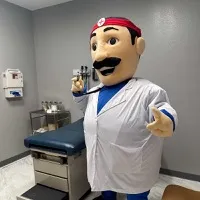 Exterior of Dr. Amigo Family Clinic Airline, immigration medical exam clinic in Houston, Texas